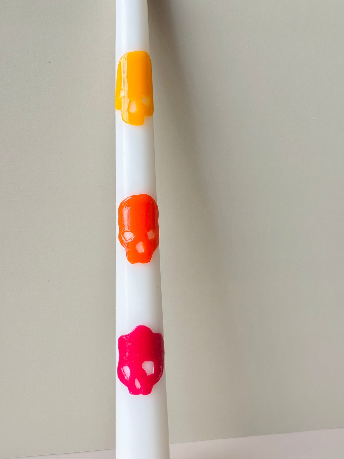 Memento Skull Taper Candle – Orange and Pink