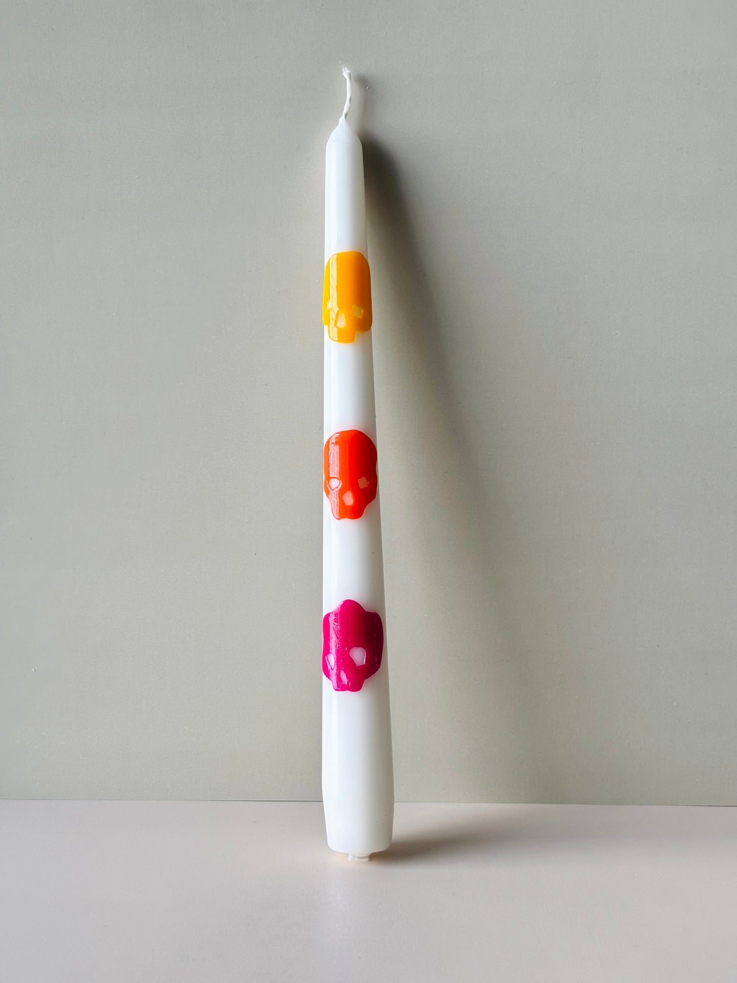 Memento Skull Taper Candle – Orange and Pink
